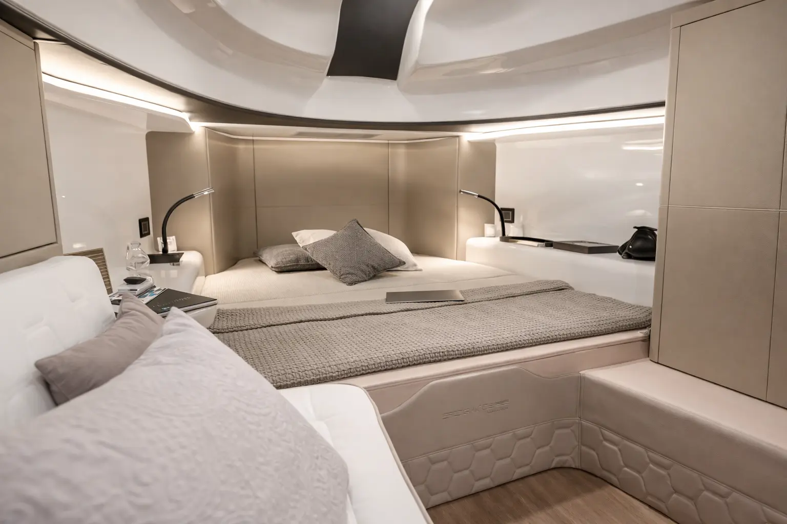 SACS Strider 15 luxury below-deck cabin with double bed and ambient lighting