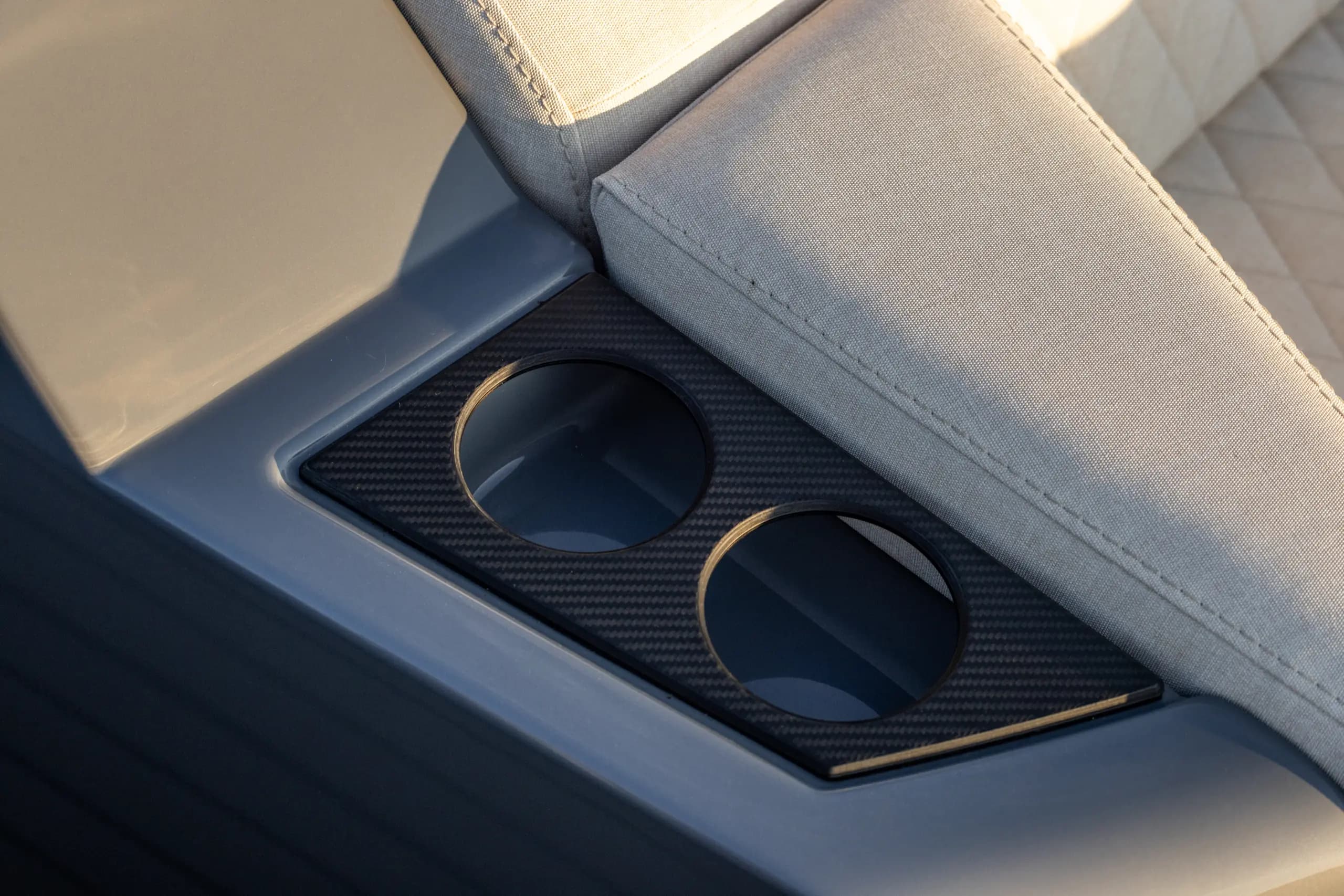 Carbon fibre cup holders and premium upholstery on Vanquish VQ40