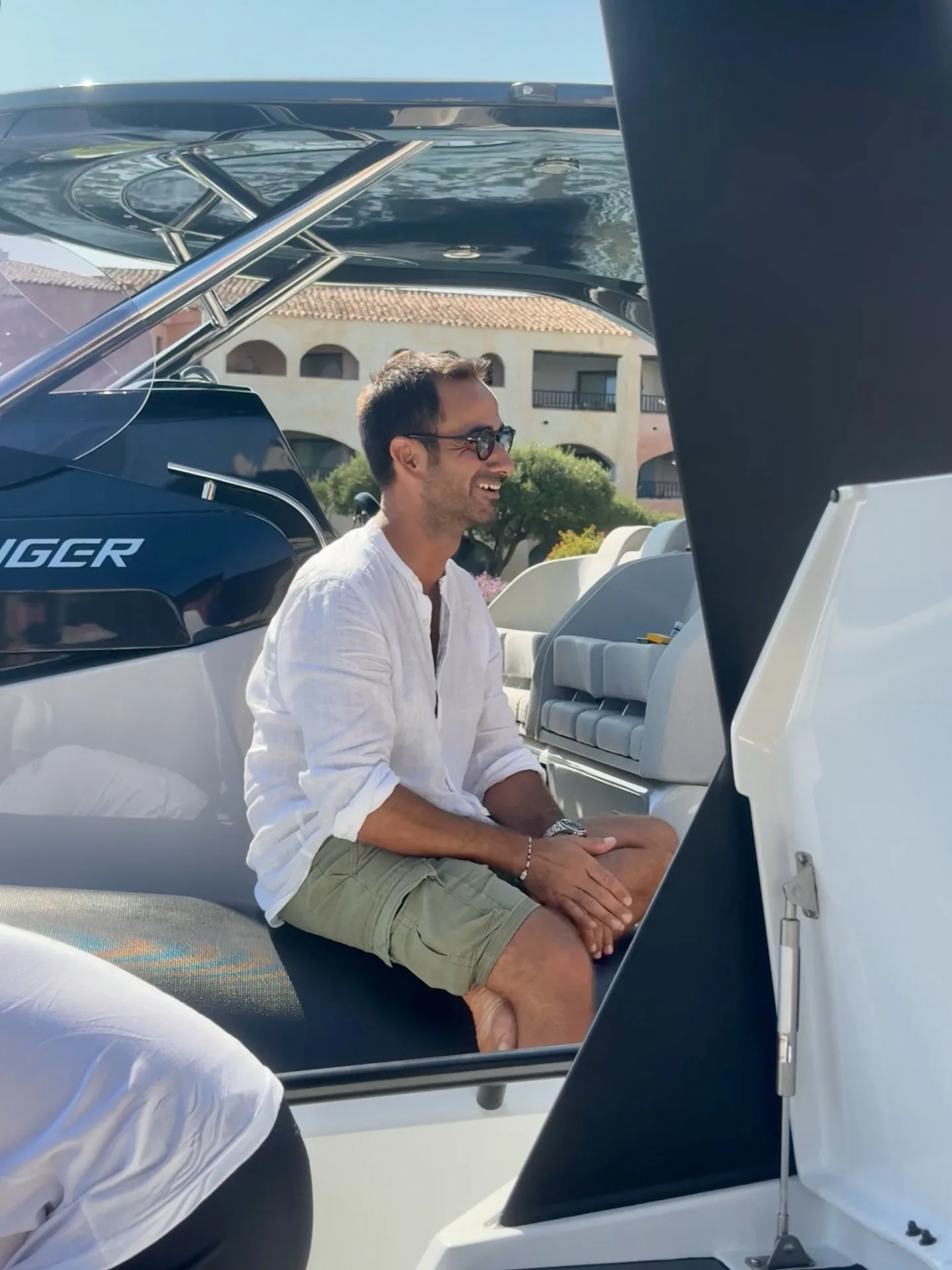 Marco relaxing aboard a MareFun SACS Strider yacht in a Sardinian marina
