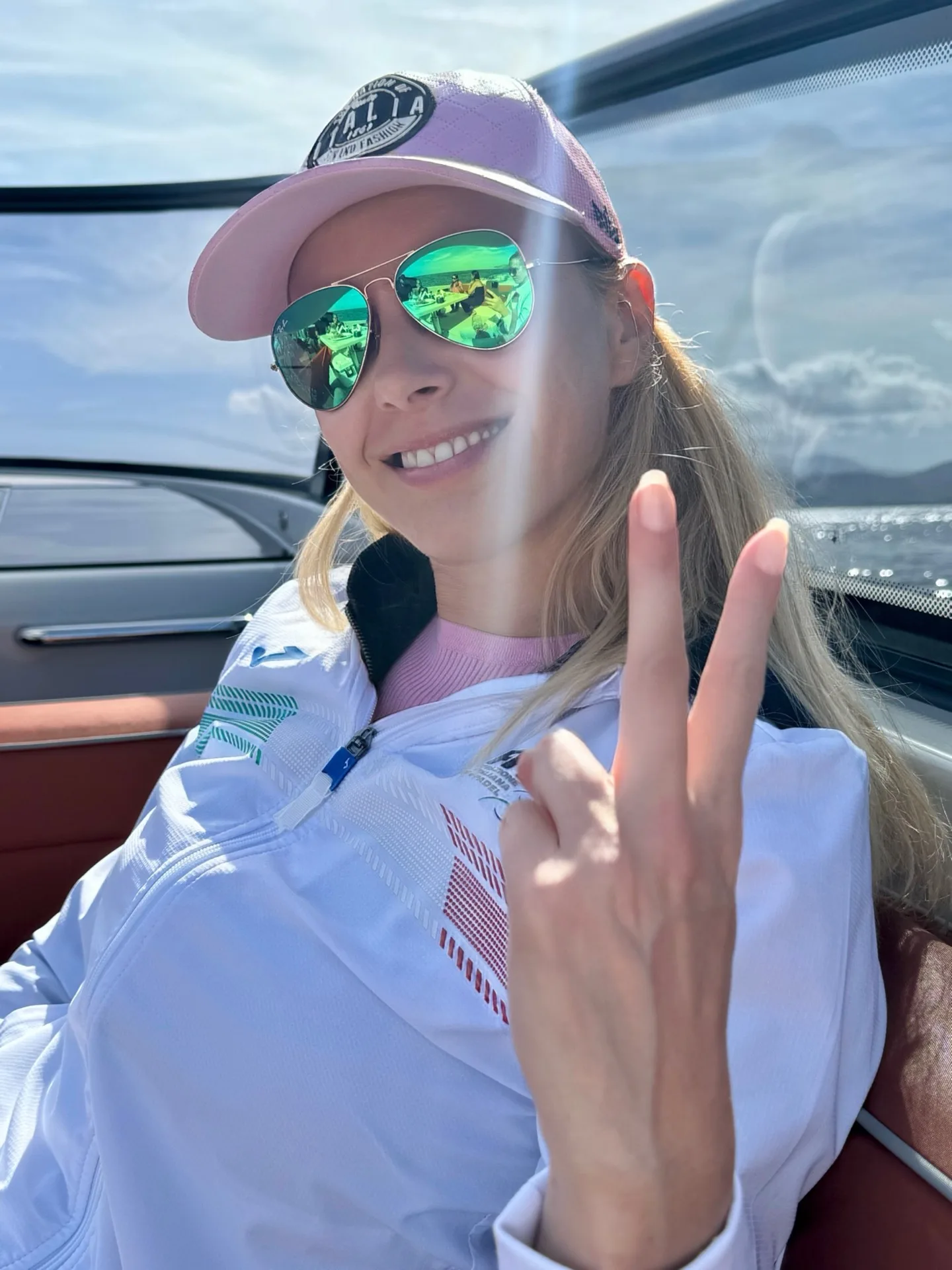 Nadia from MareFun smiling on board a charter boat in Sardinia