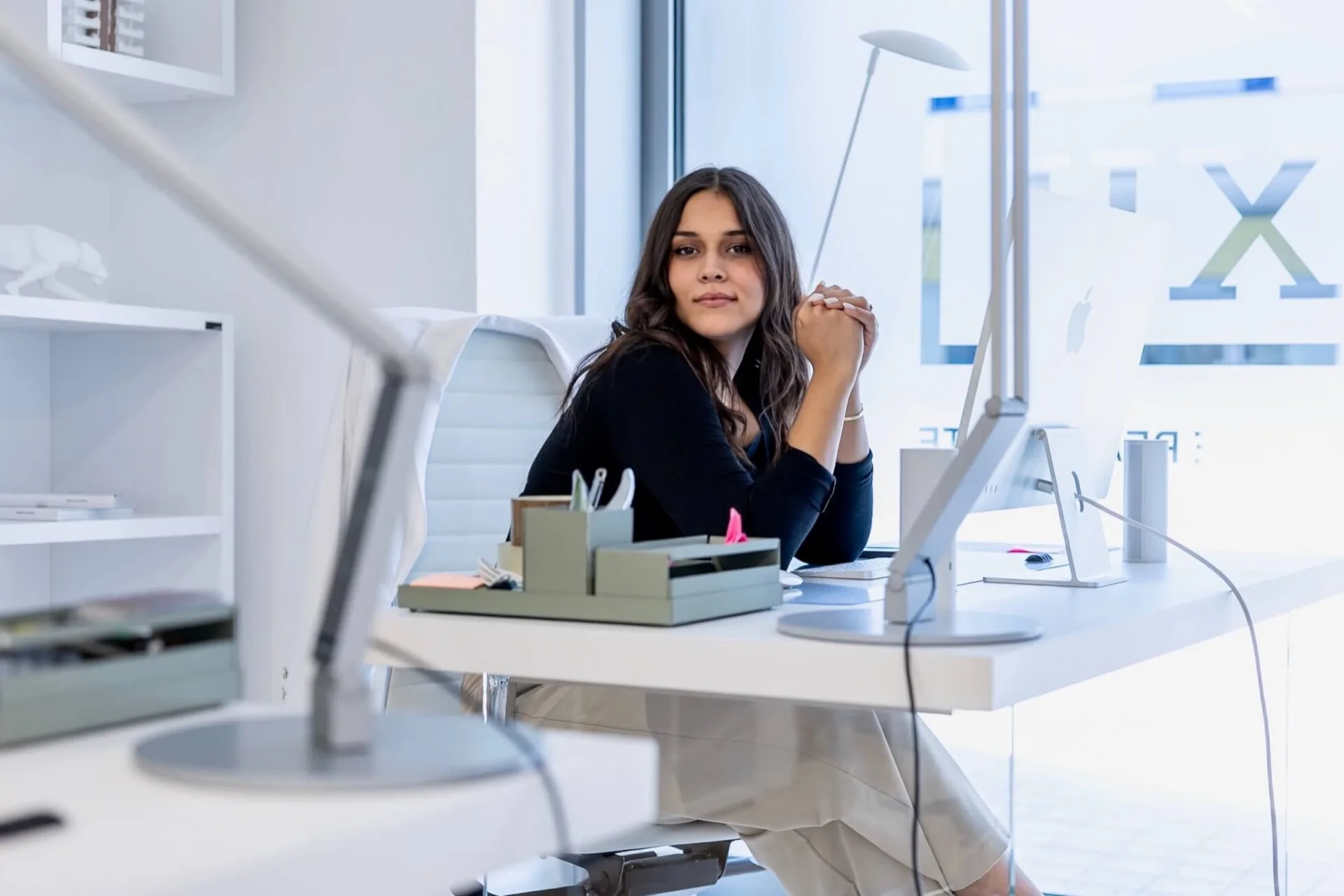 Kristina from MareFun at her creative studio desk with design materials